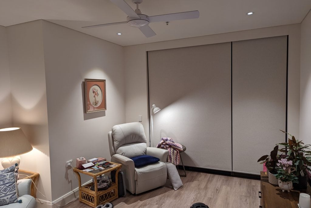 Showing aged care safe window furnishings in a calm living area for residents’ comfort and safety.
