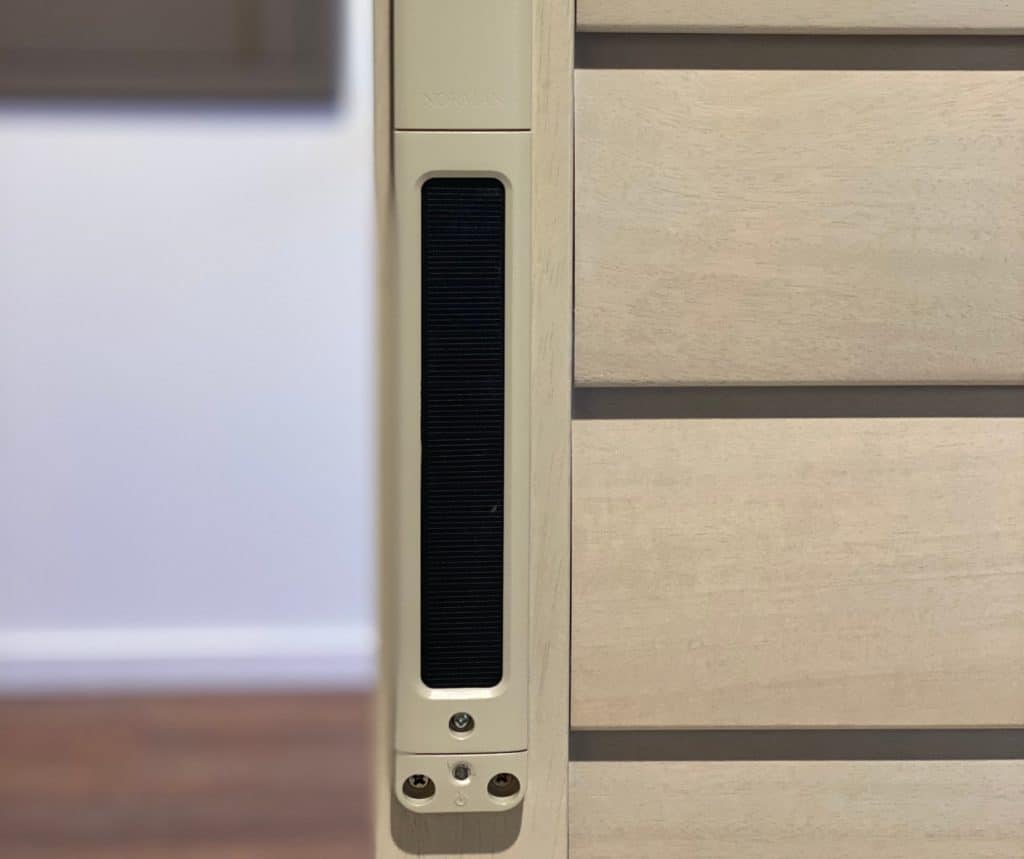 Showing a motorised-shutter-solar-strip attached to a plantation shutter frame.