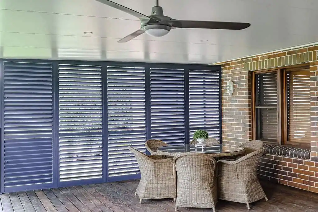 Aluminium plantation shutters enclosing an alfresco dining area, Kirkham